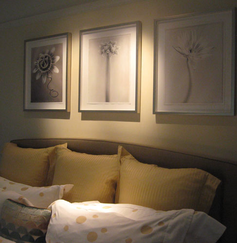 Bedroom: A beautiful series of photographs by the German photographer Karl Blossfeldt complement the serene feeling of the room.
